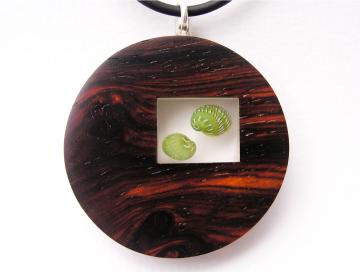 Pendant or Brooch Padauk wood with Emerald Nerites. : $110